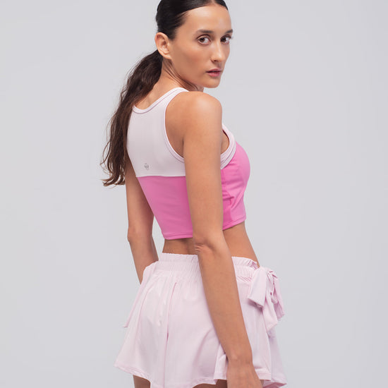 espalda del top de running rosa de tirantes Pink Sprint