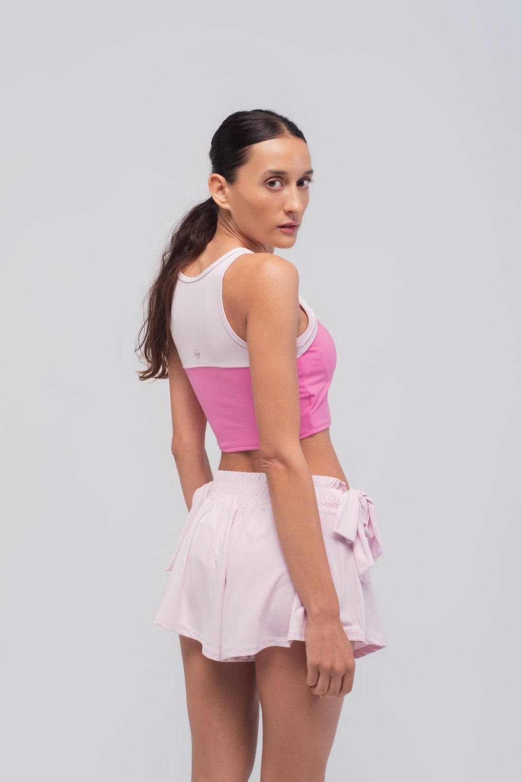 espalda del top de running rosa de tirantes Pink Sprint