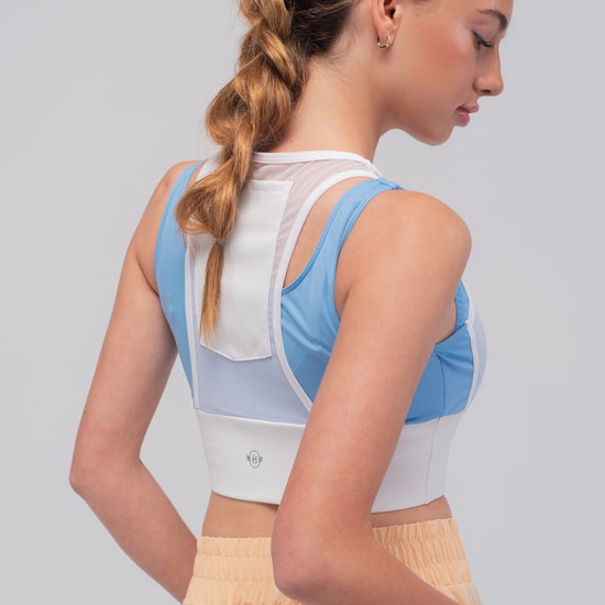 bolsillo trasero de tul del top deportivo azul Blue Rush