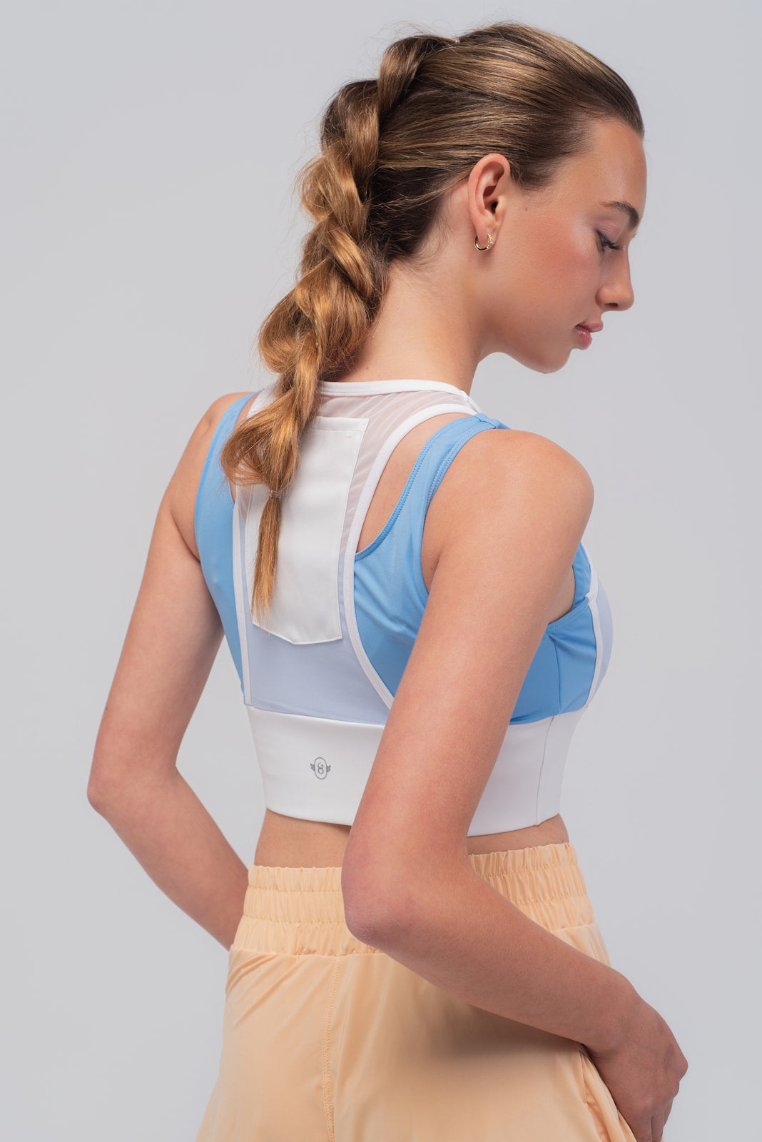 bolsillo trasero de tul del top deportivo azul Blue Rush